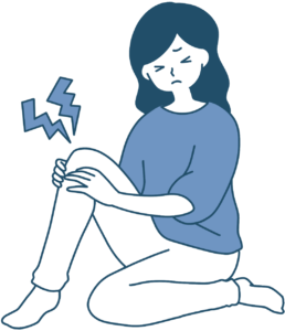 膝痛の女性